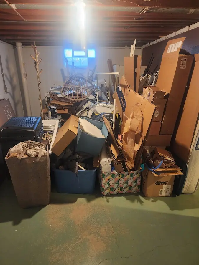 Roll-off dumpster container at job site for Yard Waste Dumpster Rental in Cheltenham